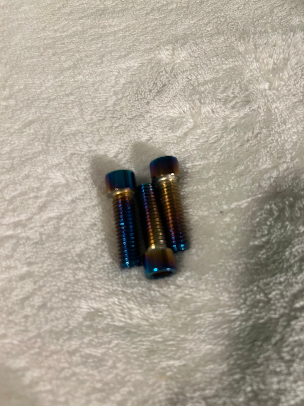 Battery titanium bolts